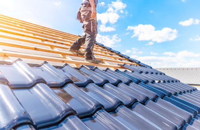 Roofing Guys Central Coast installing new terracotta roof tiles as part of a full roof repair and restoration on the Central Coast. Roofing Guys Central Coast installing new terracotta roof tiles as part of a full roof repair and restoration on the Central Coast.