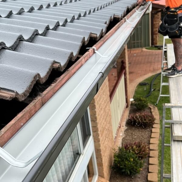 Dependable gutter installation in Central Coast. Roofing Guys Central Coast fits new guttering to tiled roofs to improve drainage and protect against water damage.